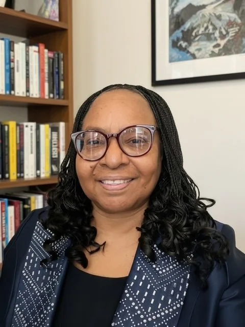 Dr. Marcia Morrison smiling in her office